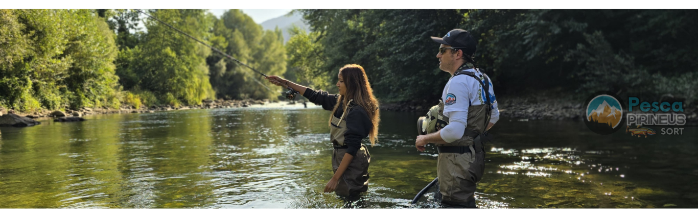 Two people fishing in a river, surrounded by trees and nature. One points forward.